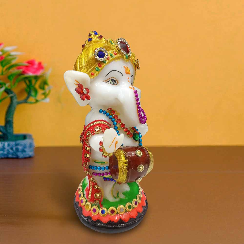 Buy White Lord Ganesha Idol Playing Dholak Online